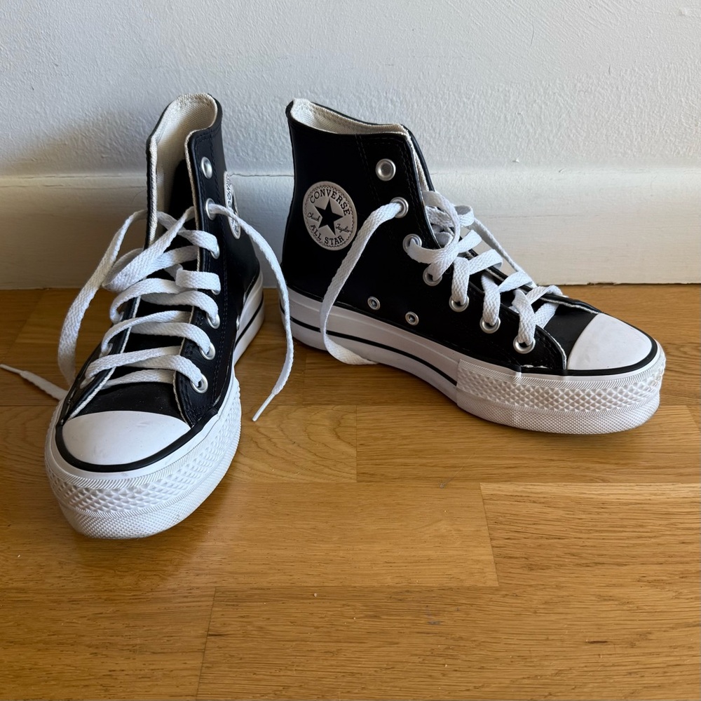 CONVERSE ALLSTARS Leather Platform High Tops in Black - 5.5 Women’s